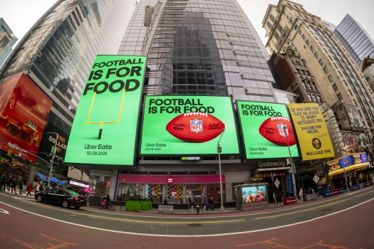 Uber Eats Superbowl advertising Advertising in Times Square in New York for Uber Eats, tied in with the upcoming Super Bowl, on Sunday, February 2, 2025.  PUBLICATIONxNOTxINxUSAxUK RichardxB.xLevine